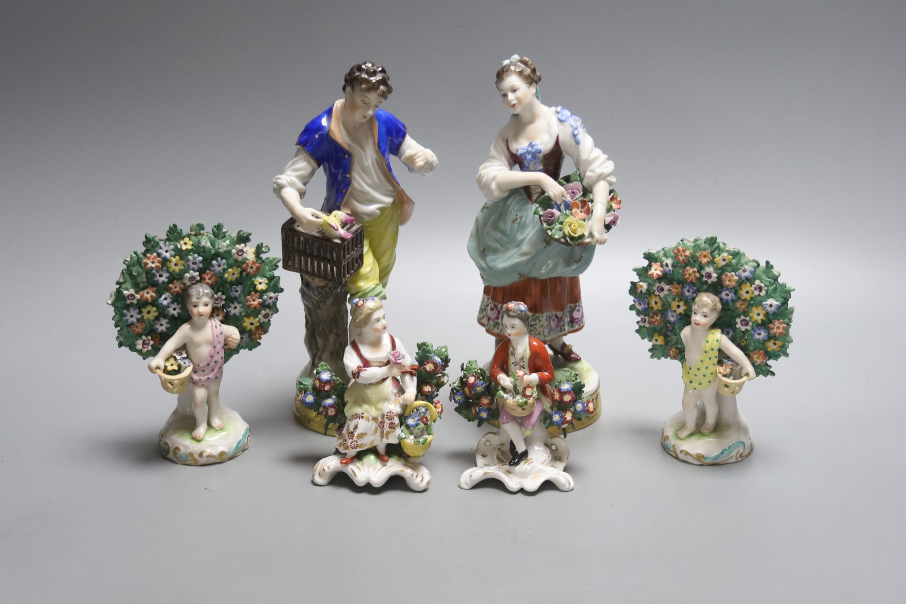 Two pairs of Samson style figures and a pair of German figures